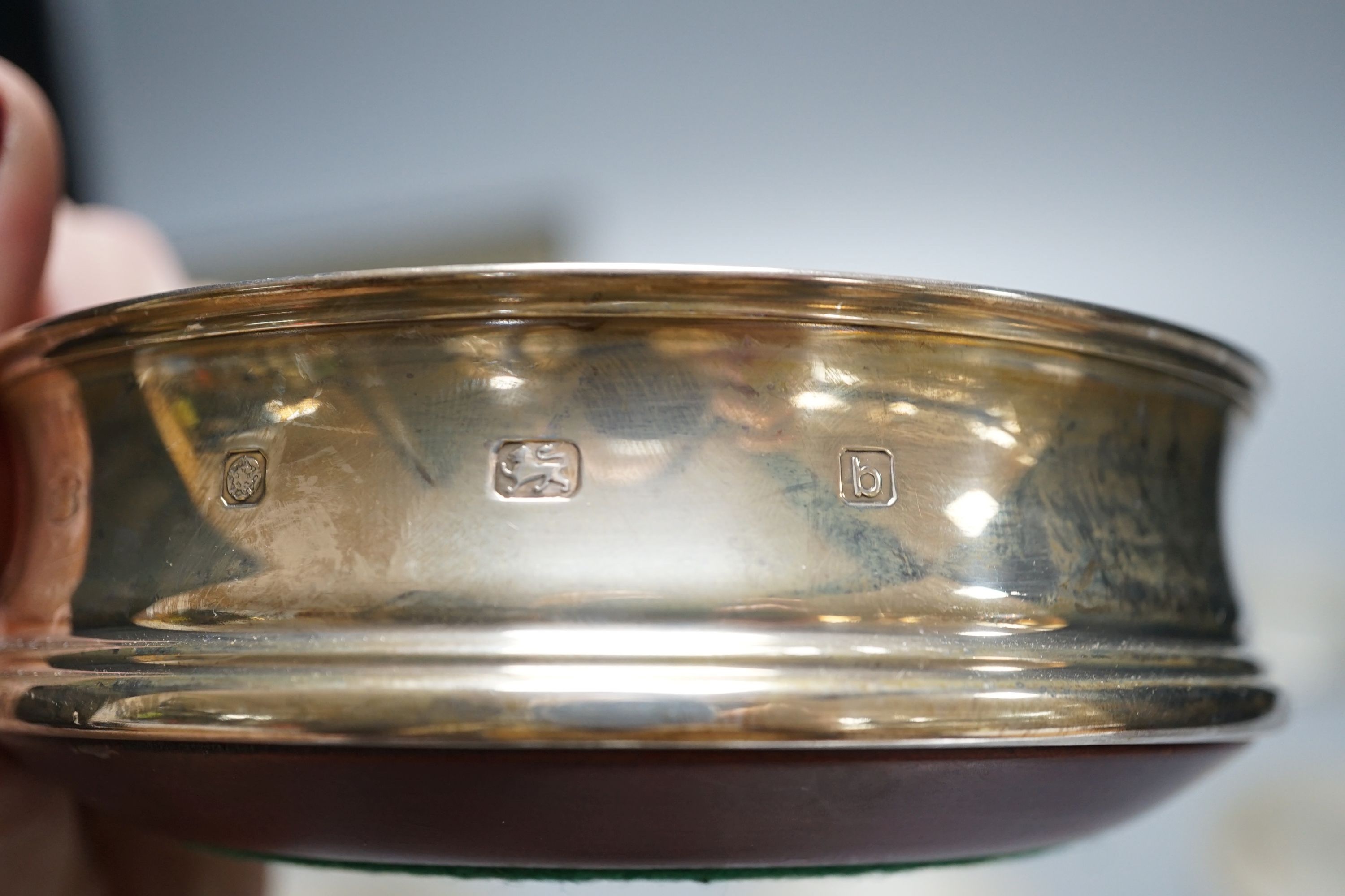 A cased set of six German 800 standard teaspoons by Robbe & Berking, a set of six silver mounted glass coaster and a modern silver mounted wine coaster.